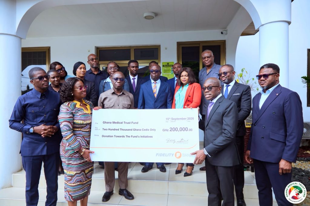 Fidelity Bank Ghana delegation presenting a GH200,000 cheque to the Ghana Medical Trust Fund